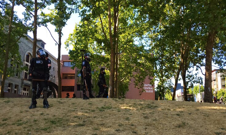 Seattle police patrolling the South Lawn of Seattle Central College