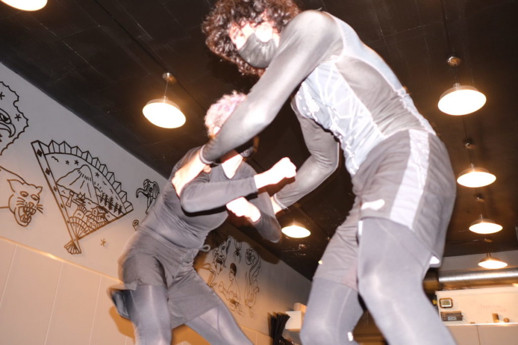 Two members of Midnight Jiu Jitsu Club spar.
