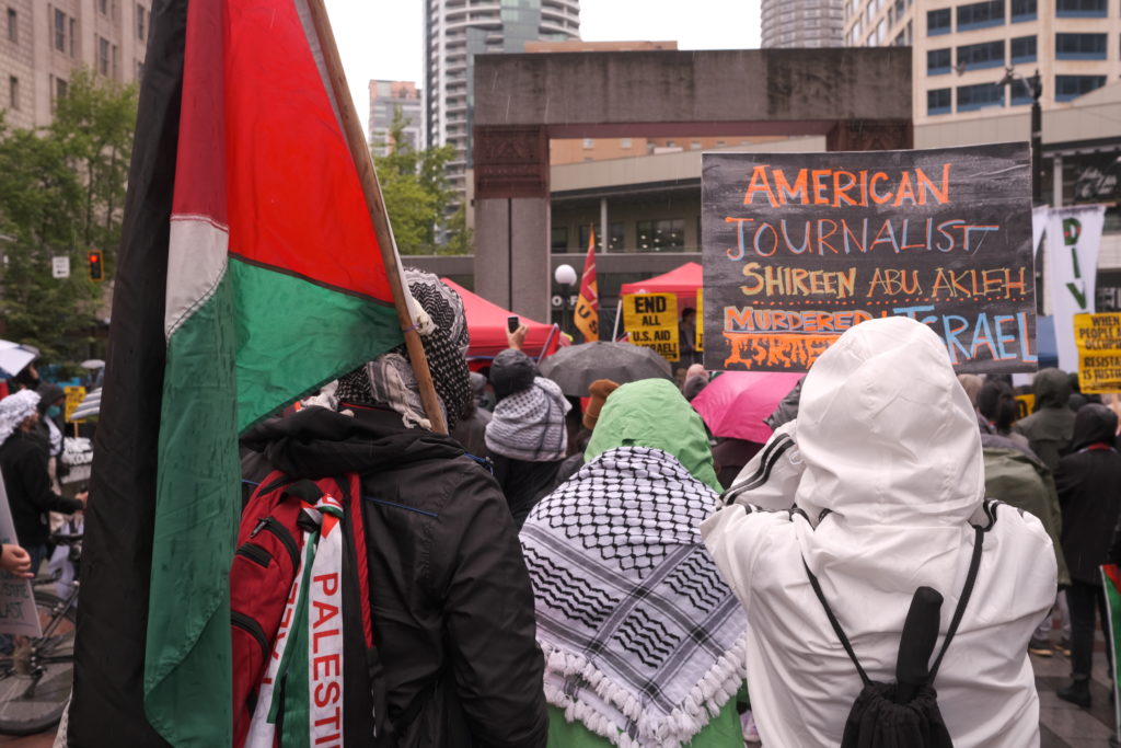 A sign speaks of the murder of Palestinian-American journalist Shereen Abu Aqleh.